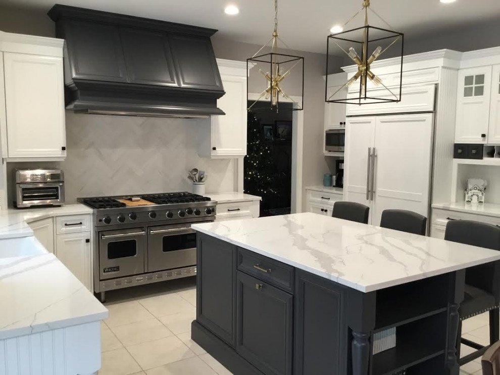 A Transitional Kitchen with a Gorgeous Herringbone Marble Backsplash